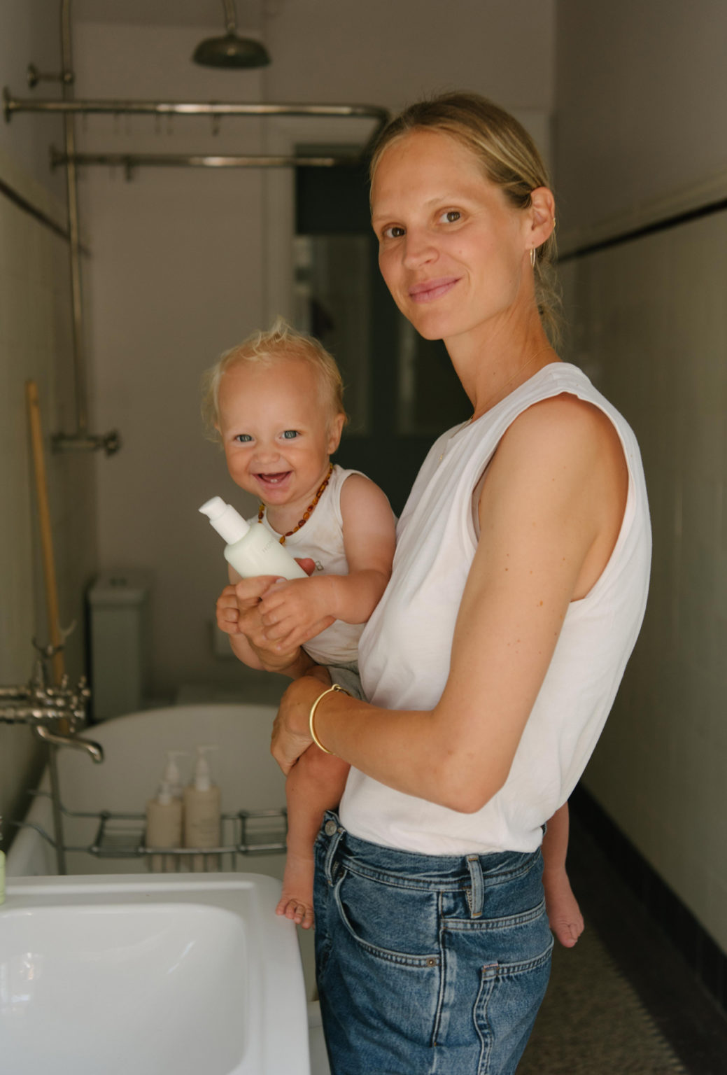 Bea Fagerholt holds her child in her arms