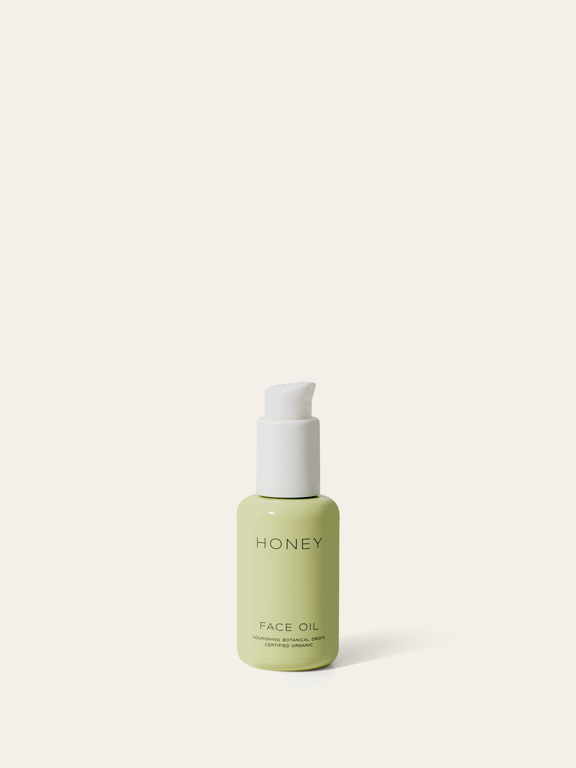 Natural fragrance-free face oil in green bottle with white cap - clean skincare