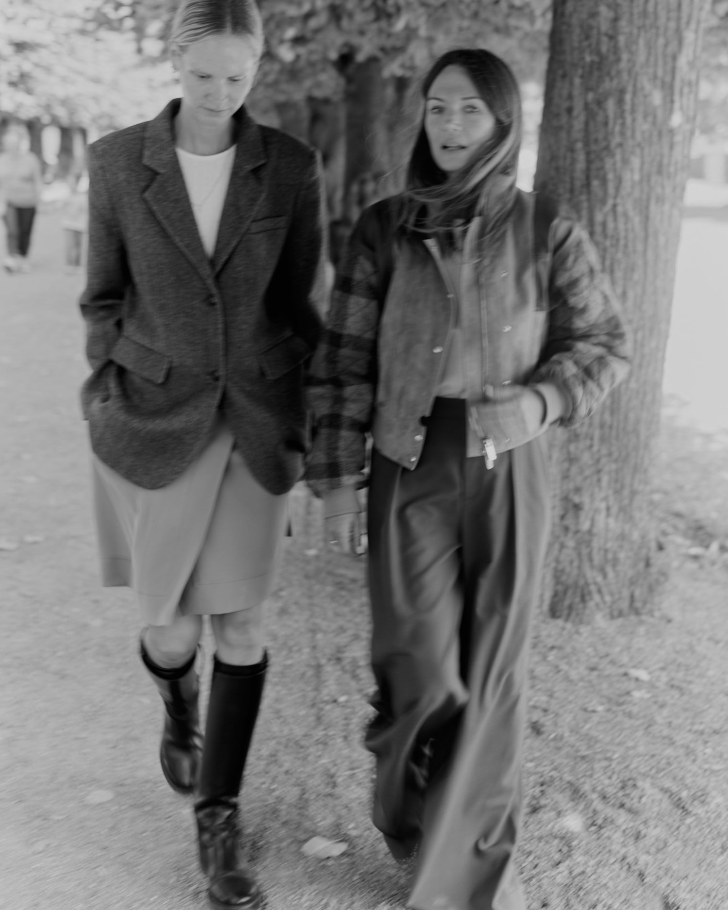 To the Moon Honey founders Liv Winther and Bea Fagerholt walking in a park during autumn dressed in warm clothing